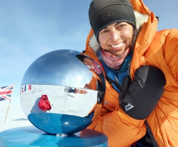 Preet Chandi in the South Pole, smiling into the camera 