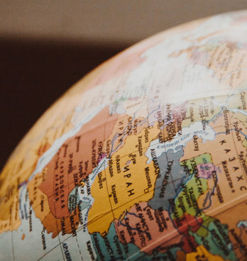 Close up of a globe orientated to show the Middle East and central Asia. 