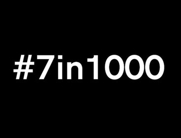 A black background with the words #7in1000 written in white