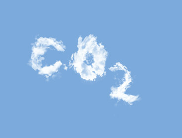 A blue sky with clouds that spell out CO2