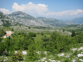 Fieldwork in Montenegro – a moraine can be seen here as a ridge in the centre of the photograph.