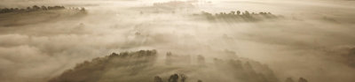 Fog surrounding Emain Macha, an Iron Age structure in Ireland.