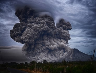 An ash plume emerging from a volcano