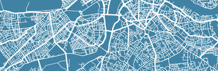 A map of an urban area with a blue background and white roads only. The roads show a pattern that reveals a river running though the urban area.
