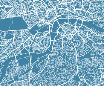 A map of an urban area with a blue background and white roads only. The roads show a pattern that reveals a river running though the urban area.