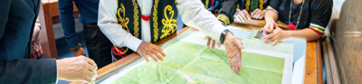 Society’s Director with representatives of the Penan communities, looking at Penan Community Maps