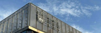 Brunel University of London buidling with blue sky background