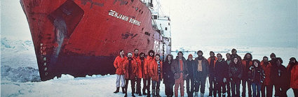 Crew from the Transglobe Expedition standing in the Arctic and posing with the Benjamin Bowring ship.