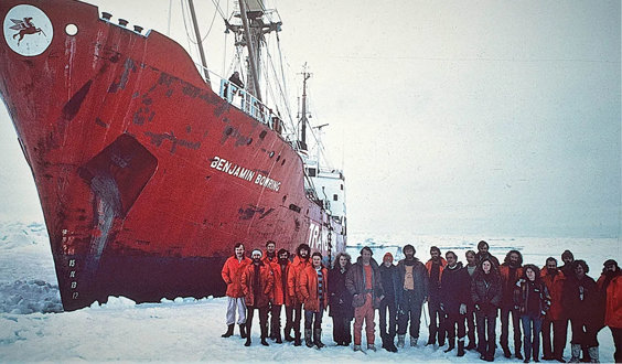 Crew from the Transglobe Expedition standing in the Arctic and posing with the Benjamin Bowring ship.