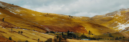 View Over Hills With Light Snow