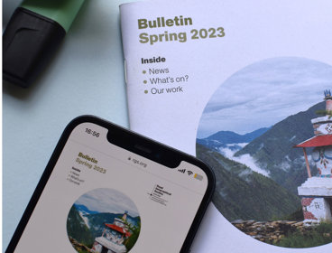 The Society's spring 2023 Bulletin in print and displayed on a phone screen.