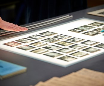 Historic lantern slides on a lightbox