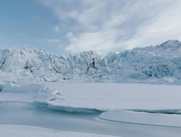 A snowy plain and glacier.