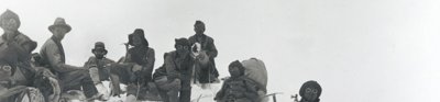  Team members including Mallory and Sherpas at a rest stop on Everest