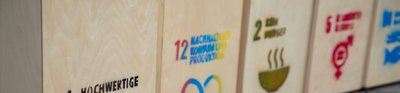 The sustainable development goals printed onto wooden boxes