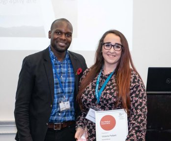 The winner of the Rex Walford Award in 2019 receiving her certificate 