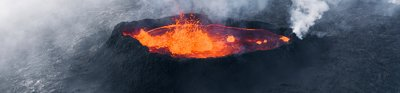 A volcanic crater with lava and gases