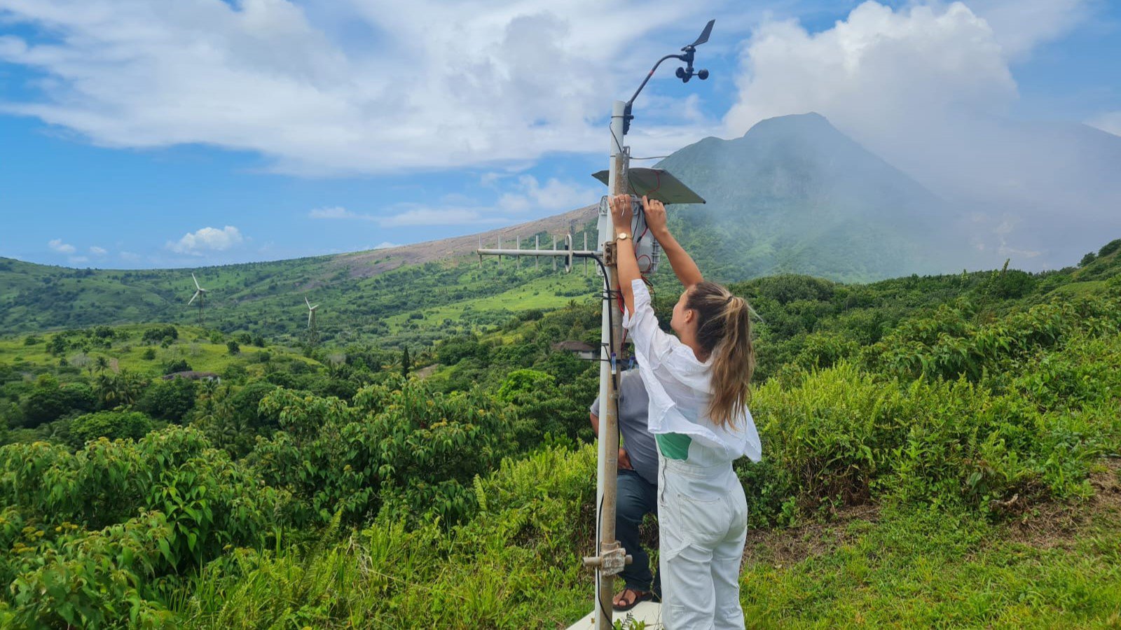 Air Quality Monitoring At St George's Hill, Montserrat. Volcanic Plume In Background