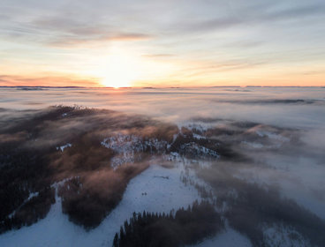 Icey landscape with a sunset sky background