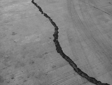 A fault line in a grey road