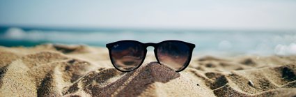 Sunglasses on a sandy