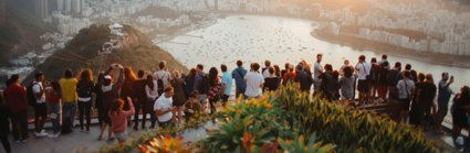 A crown of people at a view point in Rio