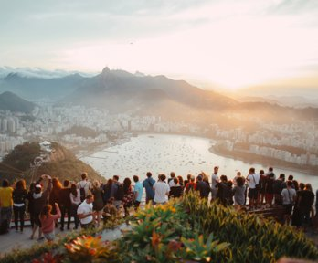 A crown of people at a view point in Rio