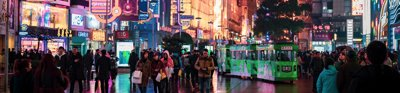 An urban chinses scene with people and neon lights