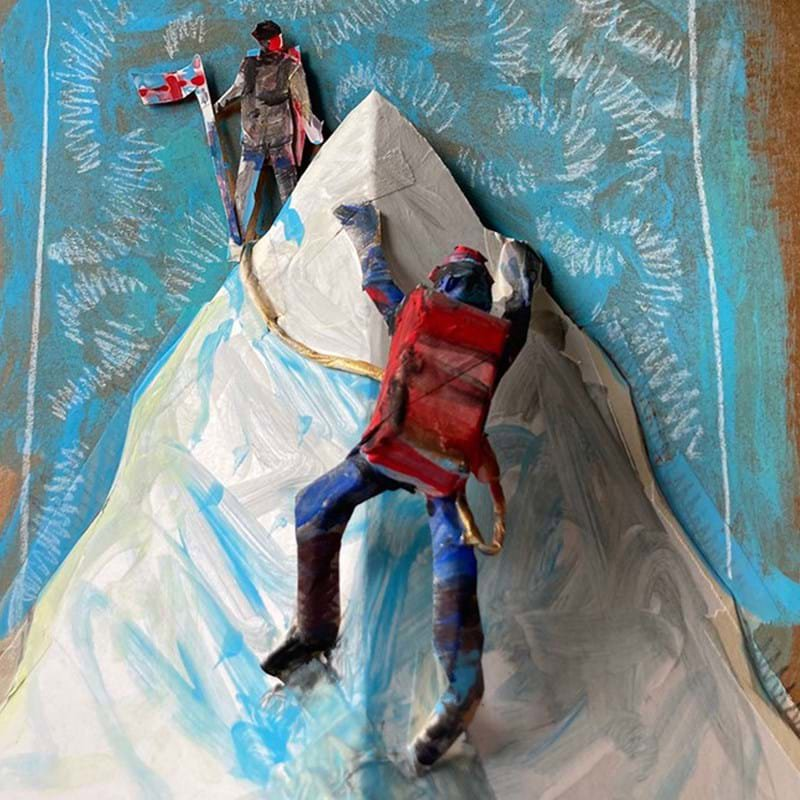 A paper model of a men climbing everest, one is climbing the mountain and attached via a rope to another standing on the top