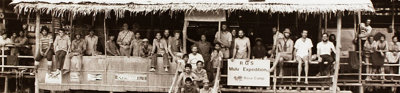 Group photo in black and white taken at base camp of the Gunung Mulu expedition, 1977 and 1978.