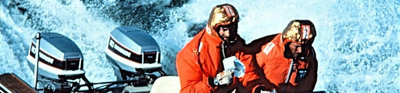 Fiennes and Burton navigate through rough sees in their Boston Whaler.