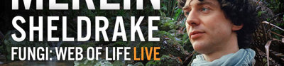 Person against backdrop of forest and fungi with a text overlay that reads 'Merlin Sheldrake fungi: web of life live'.