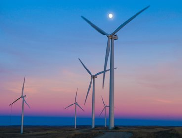 Wind turbines on a background of blue and purple evening sky