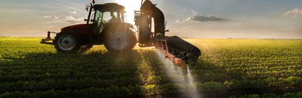 A tractor ploughing a field