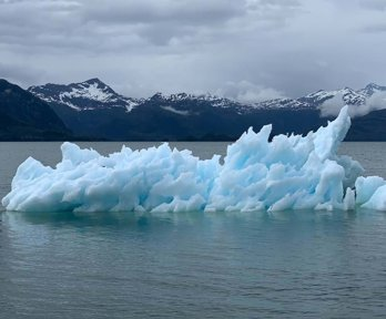 Antarctic scene with attractive blue glacier floating in the ocean