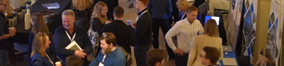 GeoCom attendees networking in the Society's Main Hall 