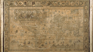 World map on a Mercator projection, embellished with sea monsters, sailing ships, and elaborate cartouches.