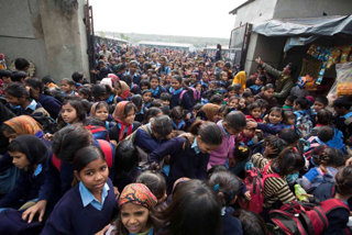 Figure 14 The end of the morning school shift in Mandanpur Khadar, Delhi, India.