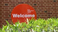 Orange welcome sign that reads Royal Geographical Society with IBG.