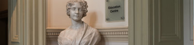 White marble bust of Lady Jane Franklin on a pedastal.