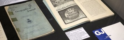 Display of historic materials including printed journal volumes
