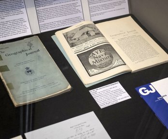 Display of historic materials including printed journal volumes