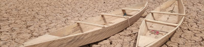 Abandoned fishing canoes on a dry lake in Ouagadougou, Burkina Faso.