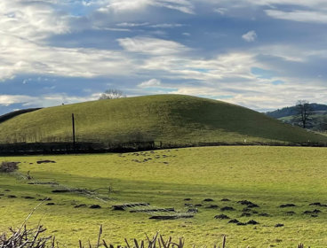 View of a drumlin, a mound-shaped hill.