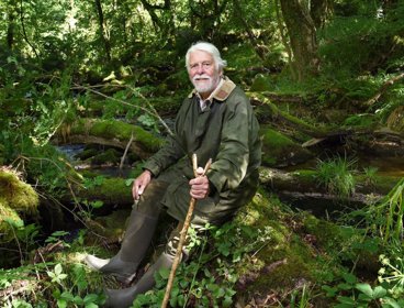 Robin Hanbury-Tenison in temperate rainforest in Cornwall