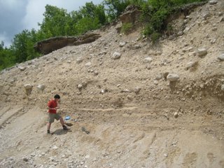 Fieldwork in Montenegro – here you can see river sediments with glacial sediments on top.