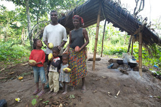 Cocoa farmers and their family in Cote d’Ivoire. Oxfam’s campaign aims to encourage companies including Nestlé to improve the livelihoods of farmers such as cocoa farmers