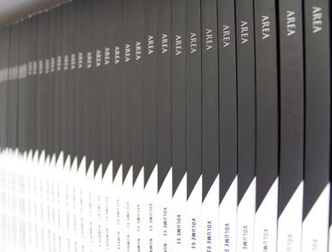 Shelf stacked with copies of the Royal Geographical Society's Area journal 