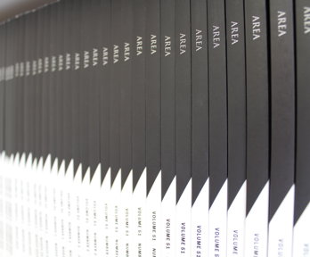 Shelf stacked with copies of the Royal Geographical Society's Area journal 
