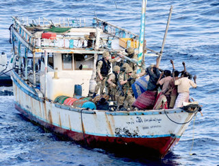 Royal Marines seize a Somali pirated vessel. 